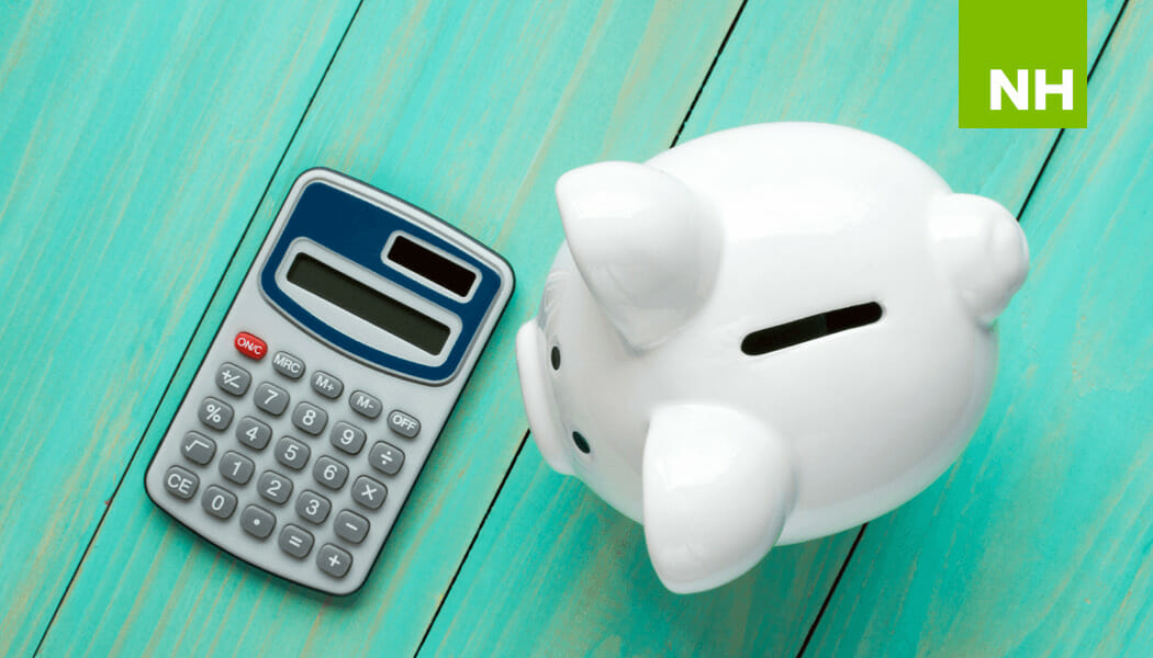 Calculator and piggy bank depicting nonprofit reserve funds